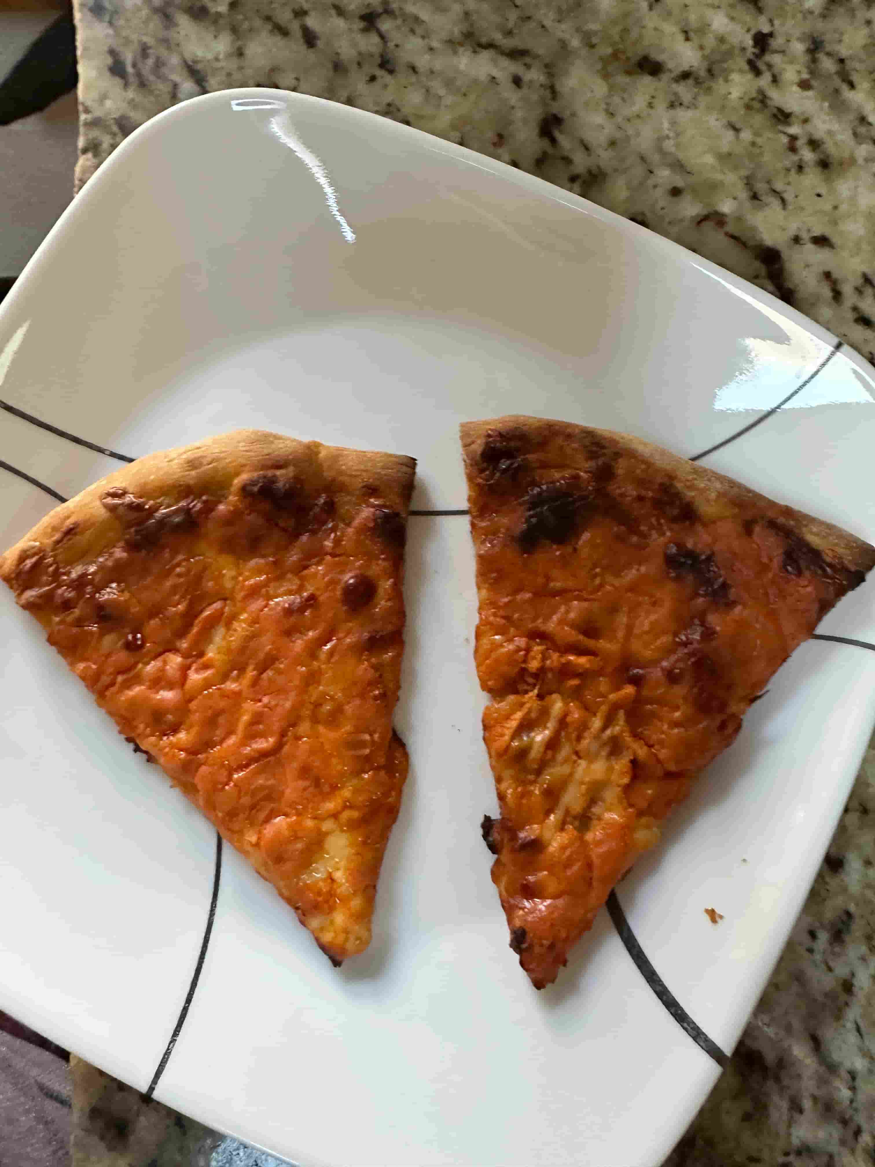 Two slices of vodka pizza